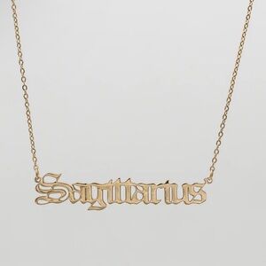 Gold Tone Sagittarius Necklace

NWT